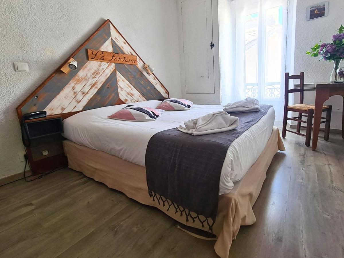 Hotel La Fontaine Saint-Martin-de-Brômes Esterno foto
