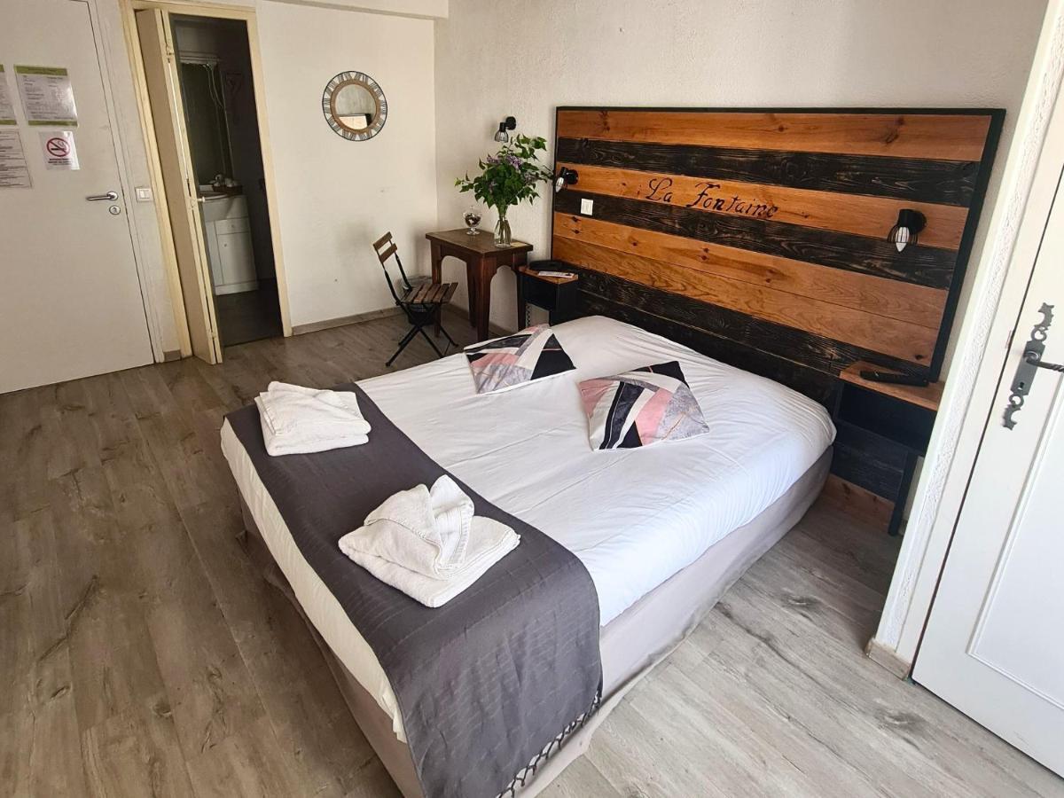 Hotel La Fontaine Saint-Martin-de-Brômes Esterno foto